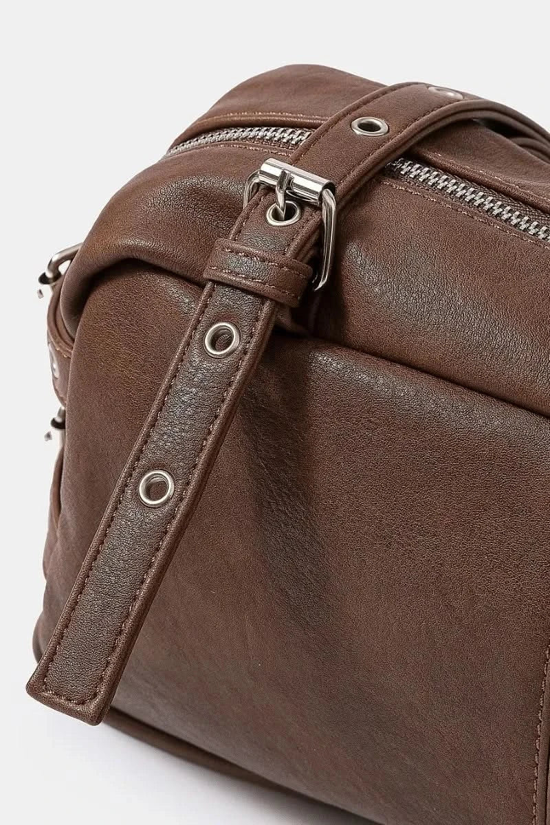 Fame Multi Grommet Belt Strap Rustic Rectangular Hand Bag