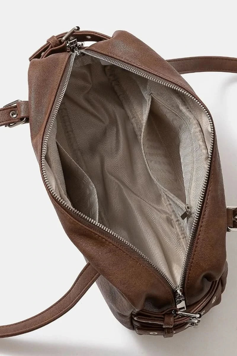 Fame Multi Grommet Belt Strap Rustic Rectangular Hand Bag