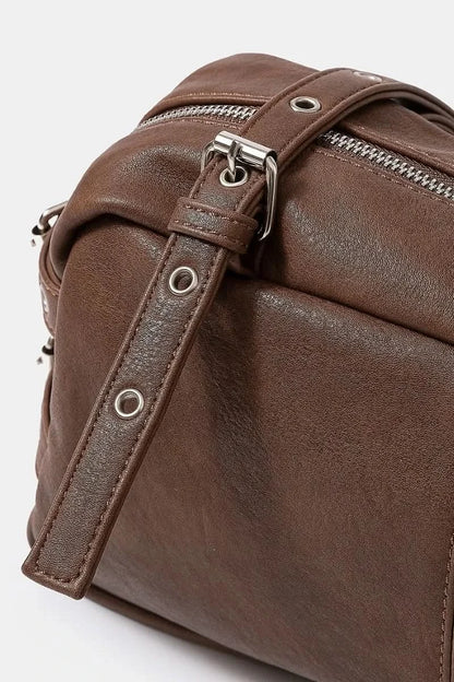 Fame Multi Grommet Belt Strap Rustic Rectangular Hand Bag