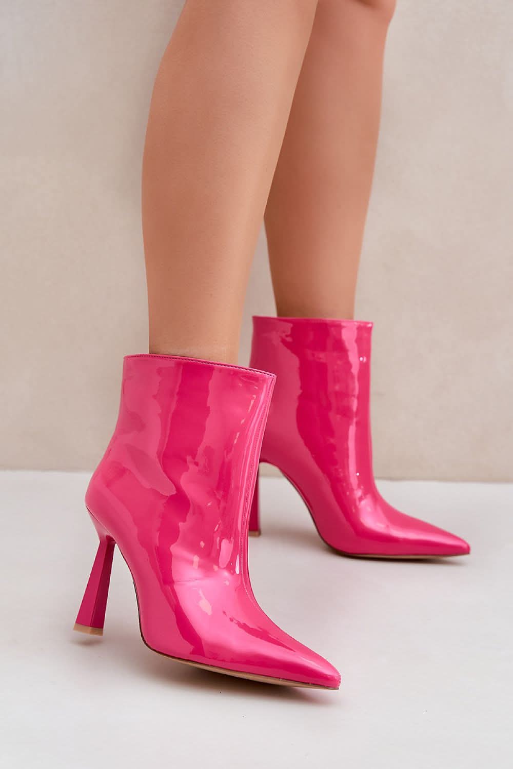 Step in style high-heeled patent ankle boots